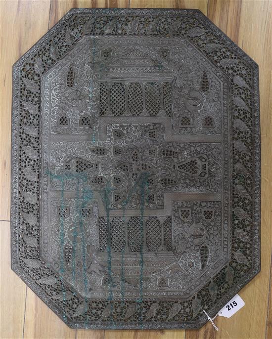 A Benares pierced brass octagonal plaque length 64cm